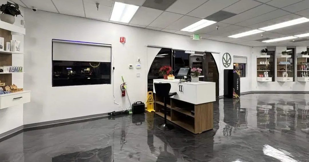 Cannavine dispensary interior with polished floor and product display shelves